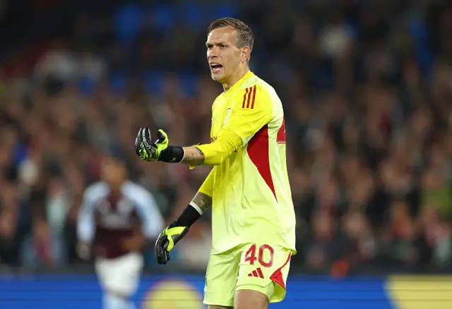 Marco Bizot of Aston Villa gesture