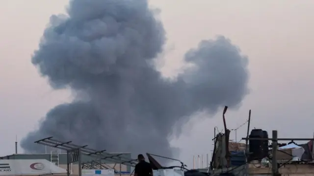 Smoke rises following an Israeli airstrike in Khan Younis, southern Gaza Strip