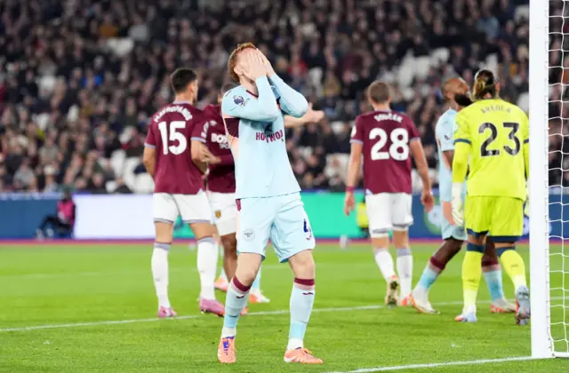 Brentford's Sepp van den Berg reacts to a missed chance