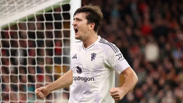 Harry Maguire celebrates