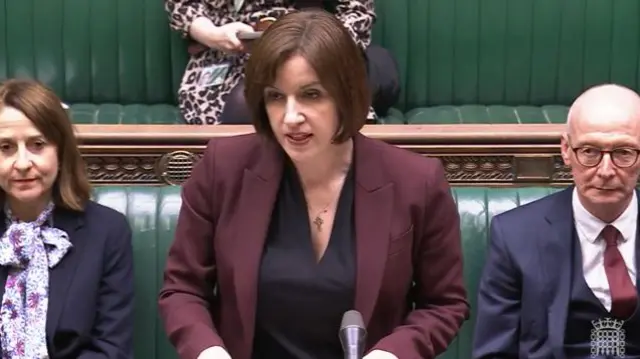 Bridget Phillipson in burgundy blazer addressing Commons