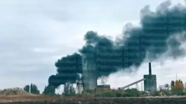 A screengrab from a verified video showing smoke billowing from the coal mine after the reported attack