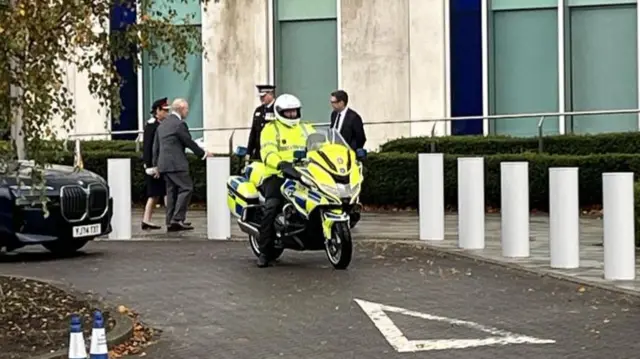 King arriving at GMP headquarters