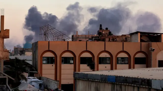 Smoke rises following an Israeli airstrike in Khan Younis