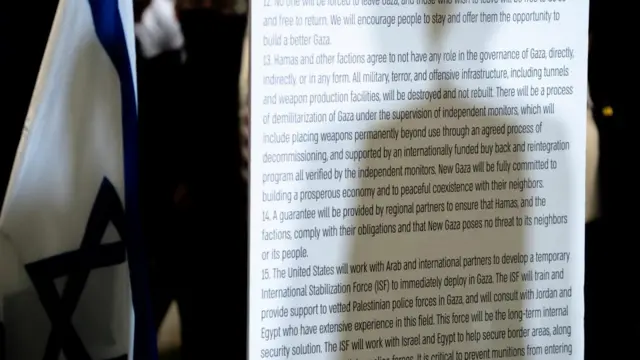 The shadow of Jared Kushner is seen as U.S. Vice President JD Vance speaks during a press conference following a military briefing at the Civilian Military Coordination Center in southern Israel on Tuesday