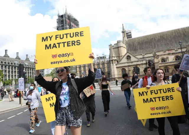Students take part in a protest through Parliament Square, central London over the government's handling of exam results after A-level and General Certificate of Secondary Education (GCSE) exams were cancelled due to the coronavirus (Covid-19) pandemic in London, United Kingdom on August 22, 2020. (Photo by Isabel Infantes/Anadolu Agency via Getty Images)