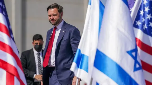 JD Vance walks among US and Israeli flags