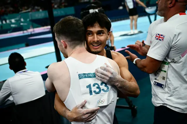Britain's Jake Jarman hugs Britain's Harry Hepworth