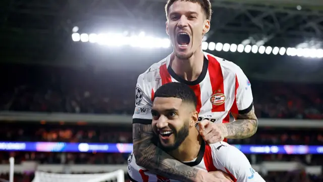 Ismael Saibari of PSV celebrates 2-1 with Dennis Man