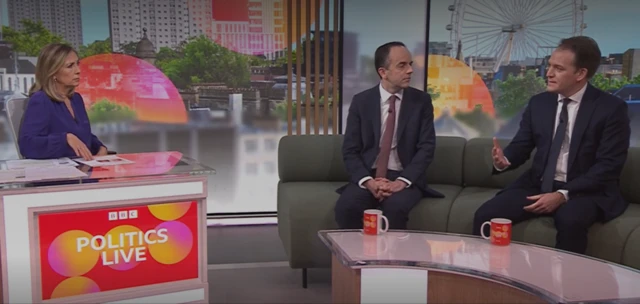 James Murray, Labour MP and Chief Secretary to the Treasury, and Gareth Davies, Conservative MP and shadow Treasury minister, are guests on BBC Politics Live. They sit on sofa in studio as guests of the BBC's Vicki Young.