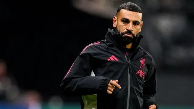 Mohamed Salah warms up for Liverpool