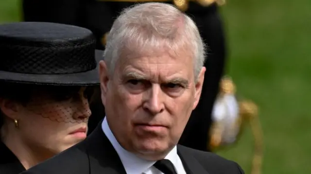Prince Andrew wears a suit at the state funeral of Queen Elizabeth