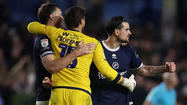 Millwall's players celebrating their win over Stoke