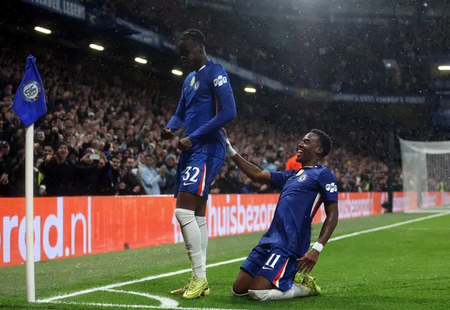 Tyrique George of Chelsea celebrates with teammate Jamie Gittens