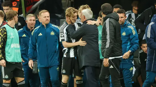 Anthony Gordon and Jose Mourinho embrace