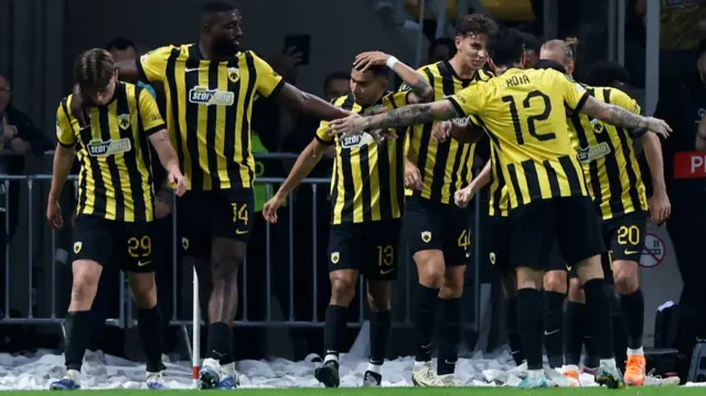 AEK Athens players celebrate