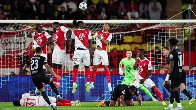 Pedro Porro takes a free-kick