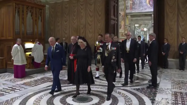 King and Queen enter chapel