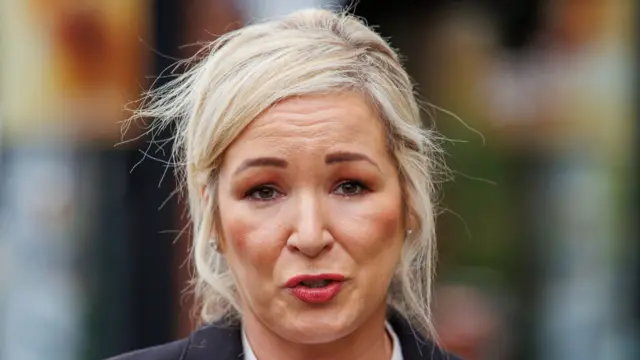 Michelle O'Neill, with blonde hair, tied up. She is pictured from the shoulders up.