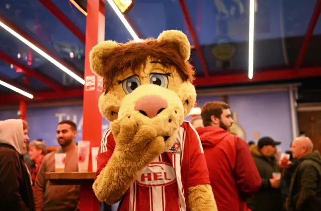 The Exeter City mascot looks on ahead of kick off