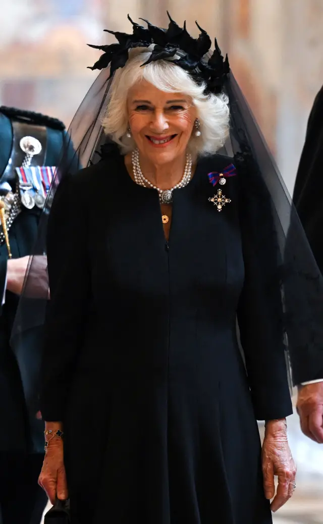 Queen dressed all in black during a visit to the Vatican