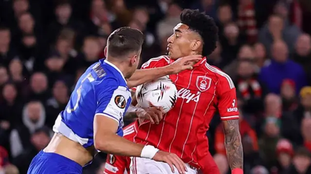Jan Bednarek of FC Porto handles the ball in the box, which leads to a penalty to Nottingham Forest during the UEFA Europa League 2025/26 League Phase MD3 match between Nottingham Forest FC and FC Porto at City Ground on October 23, 2025 in Nottingham, England.