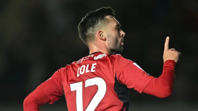 Reece Cole of Exeter City celebrates