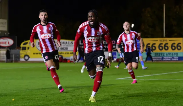 Akeel Higgins celebrates