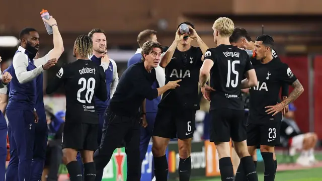 Tottenham manager Thomas Frank speaks to his players