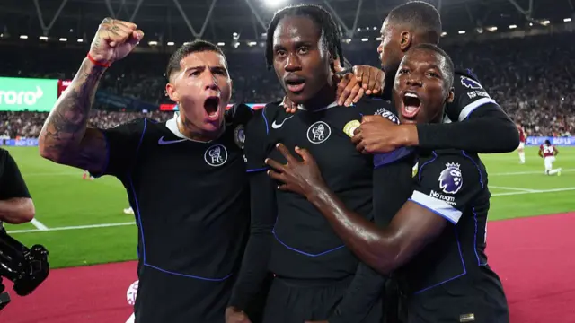 Trevoh Chalobah of Chelsea celebrates scoring the fifth goal with Enzo Fernandez and Moises Caicedo