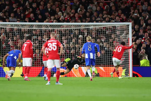 Morgan Gibbs-White scores a penalty for Nottingham Forest against Porto at the City Ground