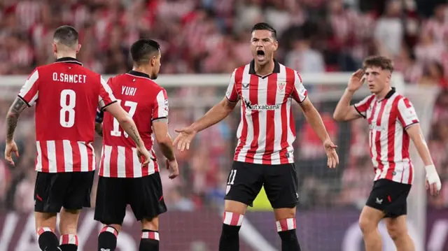 Athletic Club players celebrate
