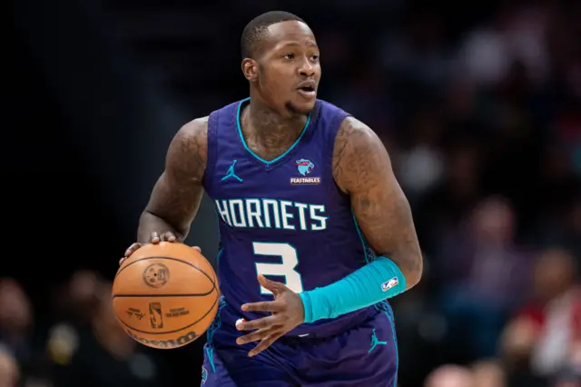Terry Rozier #3 of the Charlotte Hornets brings the ball up court