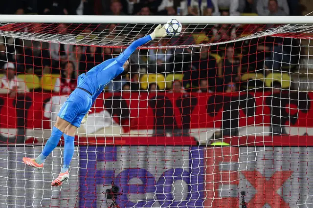 Tottenham goalkeeper Guglielmo Vicario pulls off a save