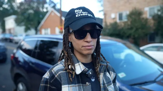 Ashley Young wearing sunglasses and a black hat with the words: Big Virgo Energy