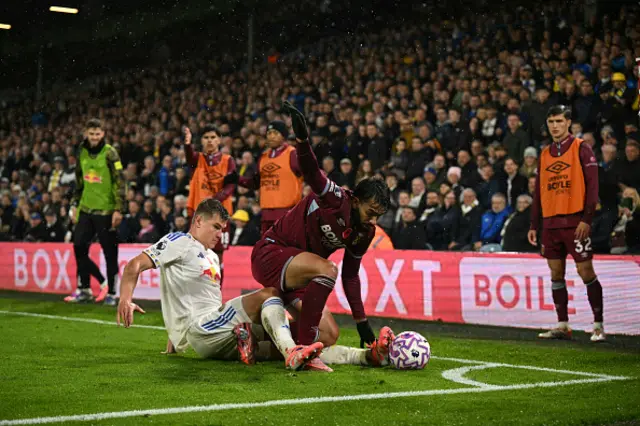 ucas Paqueta (R) and Leeds United's Slovenian defender Jaka Bijol (L) battles for the ball