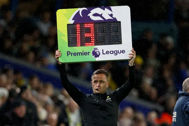 Fourth official David Webb shows 13 minutes extra time board