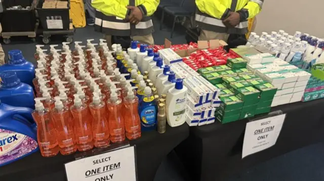 Packages are displayed for furloughed US federal workers at a special food drive in Washington DC