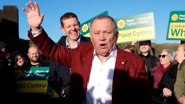 Plaid Cymru's newly elected Senedd member Lindsay Whittle speaks during a rally at Caerphilly Castle after victory for the party in the Caerphilly Senedd by-election.