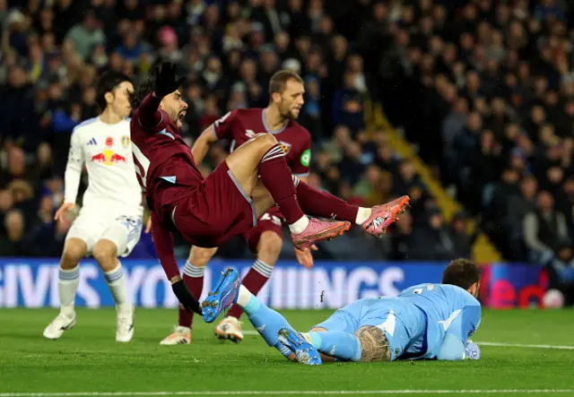 Lucas Paqueta of West Ham United is challenged by Lucas Perri