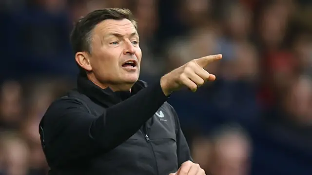 Paul Heckingbottom pointing on the sideline