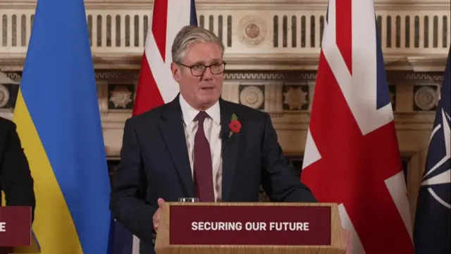 Starmer at a podium
