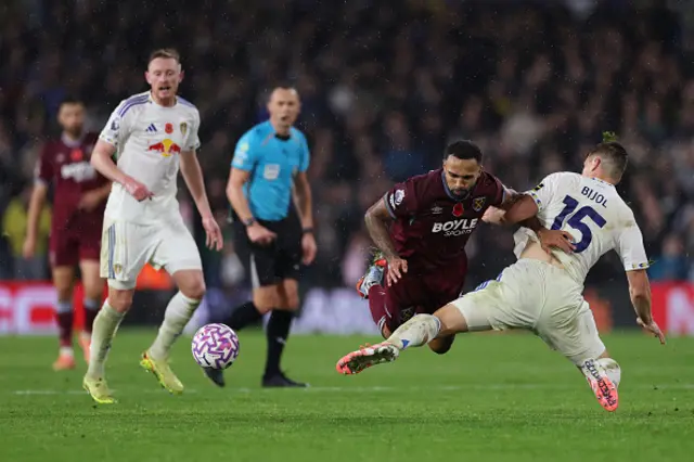 Callum Wilson of West Ham United is challenged by Jaka Bijol