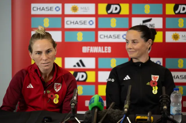 Wales' Jess Fishlock (L) and head coach Rhian Wilkinson at a press conference