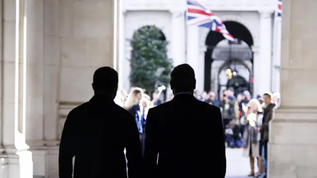 Ukraine's President Volodymyr Zelensky (L) and British Prime Minister Keir Starmer leave Downing Street