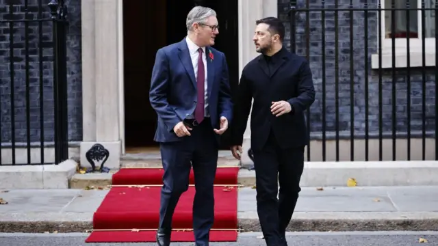 Starmer and Zelensky walk together outside No 10