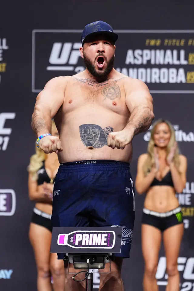 Louie Sutherland shouts as he weighs in