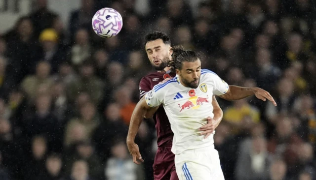 West Ham United's Max Kilman (left) and Leeds United's Dominic Calvert-Lewin battle for the ball