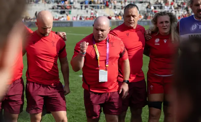 Sean Lynn gives a Wales team talk at the World Cup
