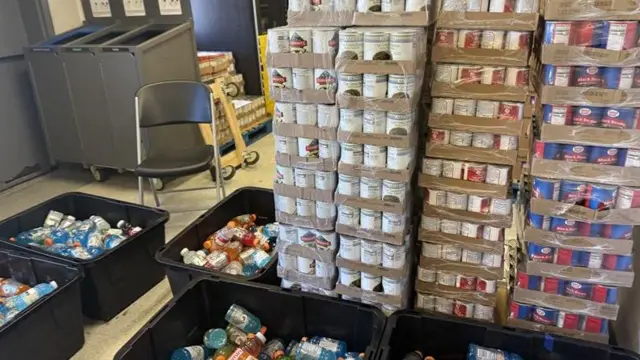 Packages are displayed for furloughed US federal workers at a special food drive in Washington DC
